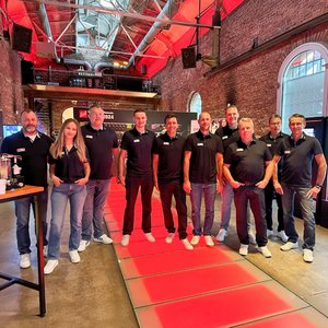 Gruppenfotos unserer Mitarbeiterinnen und Mitarbeiter auf dem SiDay 2024